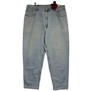VTG 560 Levi’s Loose Fit 38X30 USA slight distressing denim light wash jeans